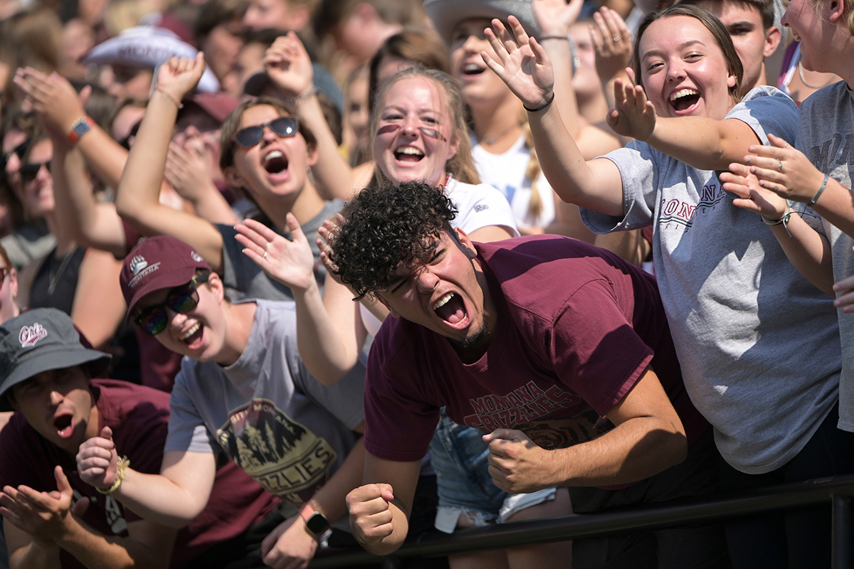 Griz fans in the student section cheer enthusiastically