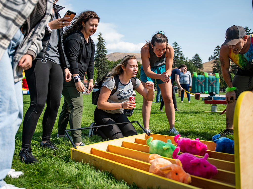 Students play a lawn game on the Oval during WelcomeFeast.